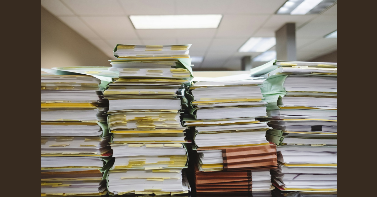A pile of books and papers