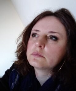 Face of beautiful woman with eyeliner and dark hair